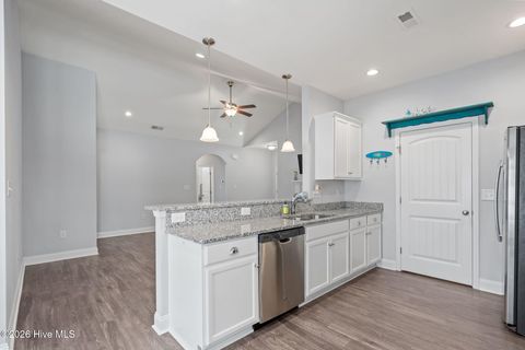 Tiny photo for 106 NW 19th Street, Oak Island, NC 28465 (MLS # 100563124)