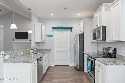 Tiny photo for 106 NW 19th Street, Oak Island, NC 28465 (MLS # 100563124)