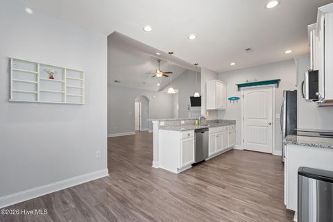 Tiny photo for 106 NW 19th Street, Oak Island, NC 28465 (MLS # 100563124)