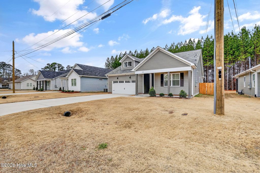 Photo of 1007 Par Three Drive S, Wilson, NC 27893 (MLS # 100556225)