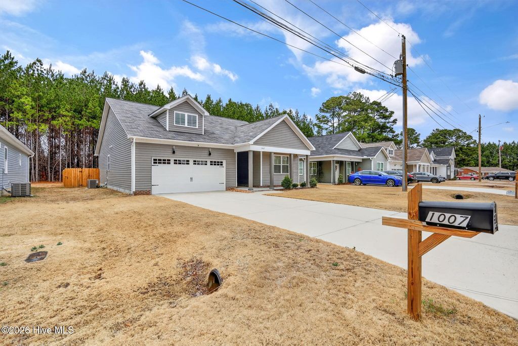 Photo of 1007 Par Three Drive S, Wilson, NC 27893 (MLS # 100556225)