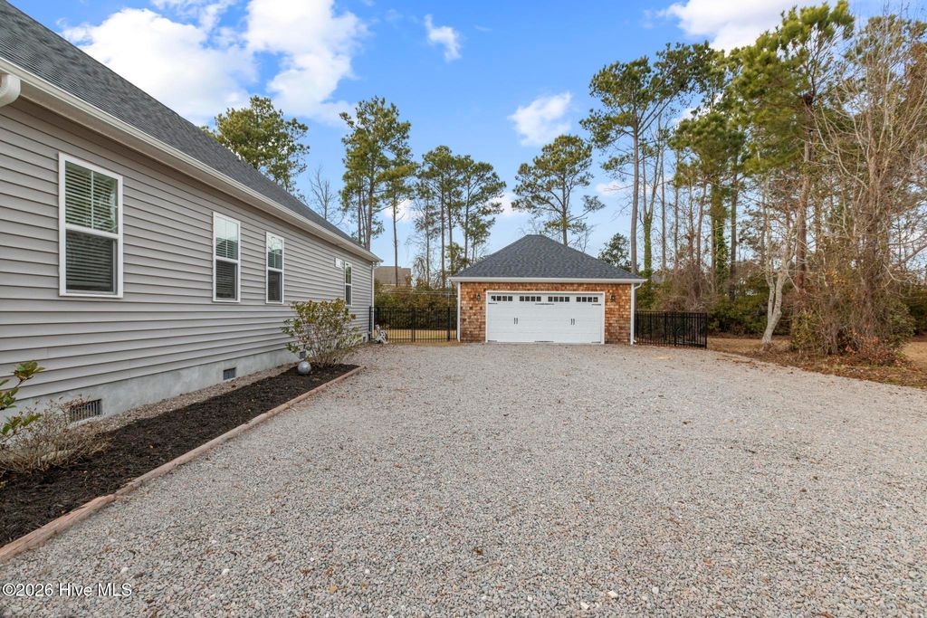 Photo of 105 Driftwood Drive, Hampstead, NC 28443 (MLS # 100552485)