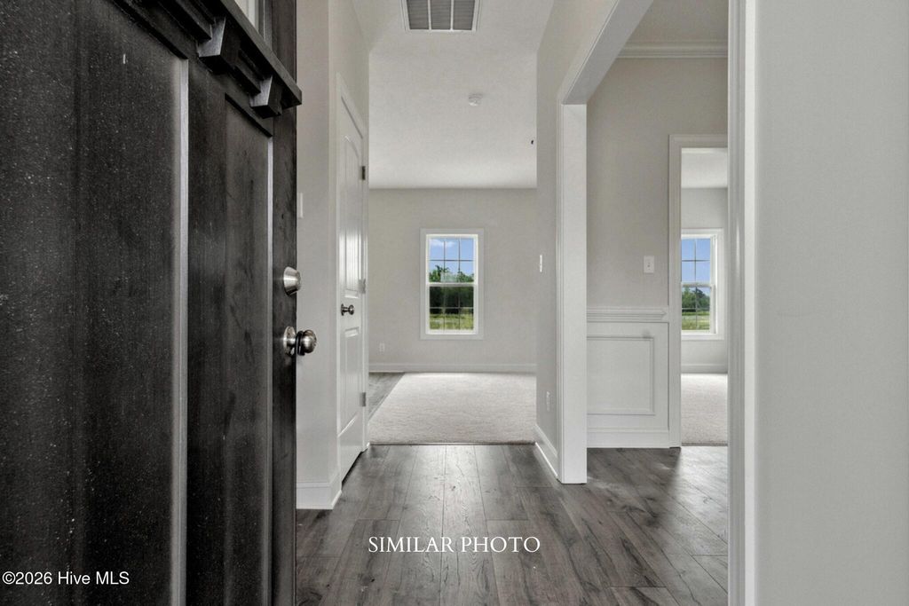 Photo of 1864 Olde Towne Pointe Boulevard, Jacksonville, NC 28546 (MLS # 100561263)