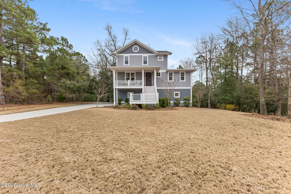 Photo of 104 W High Bluff Drive, Hampstead, NC 28443 (MLS # 100558084)
