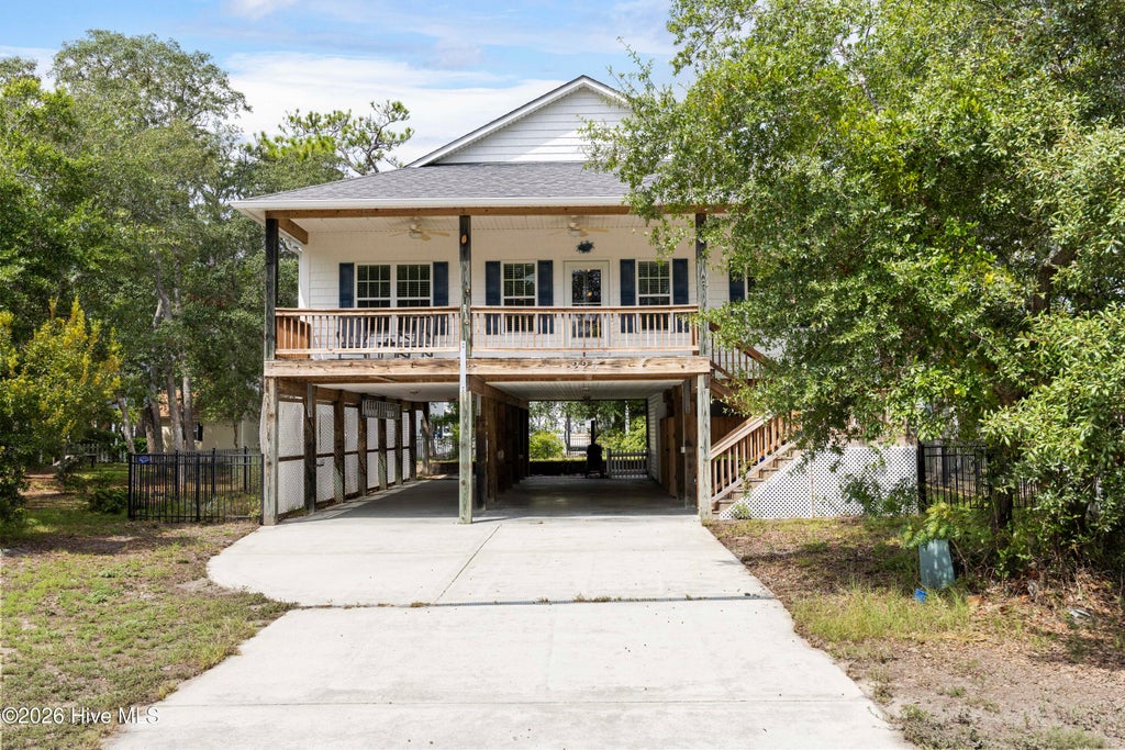 Photo of 225 NE 39th Street, Oak Island, NC 28465 (MLS # 100599905)