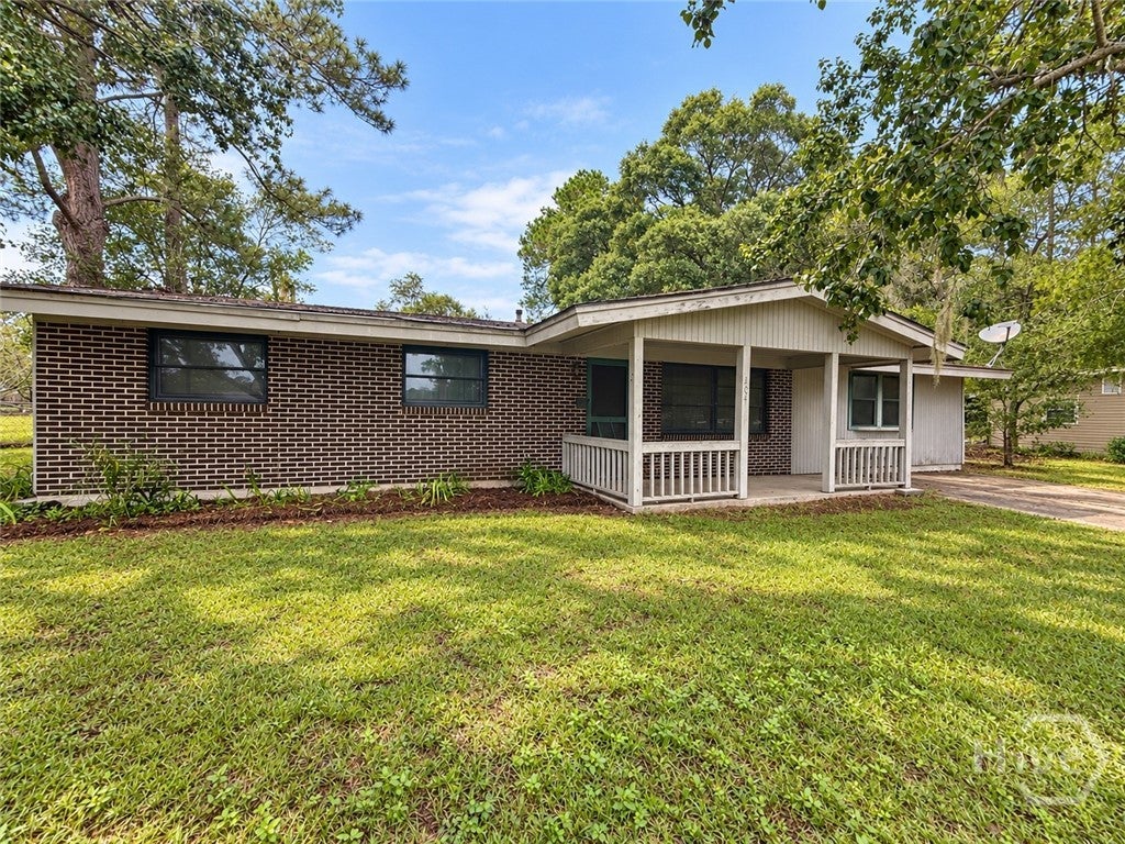 Photo of 404 Mottweiler Street, Rincon, GA 31326 (MLS # SA366120)