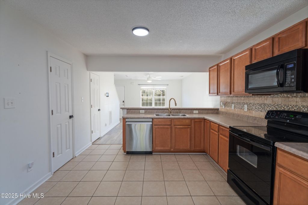 Photo of 2000 Grandeur Avenue, Jacksonville, NC 28546 (MLS # 100545536)