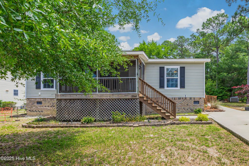 Photo of 3344 Marina Drive SE, Bolivia, NC 28422 (MLS # 100508775)