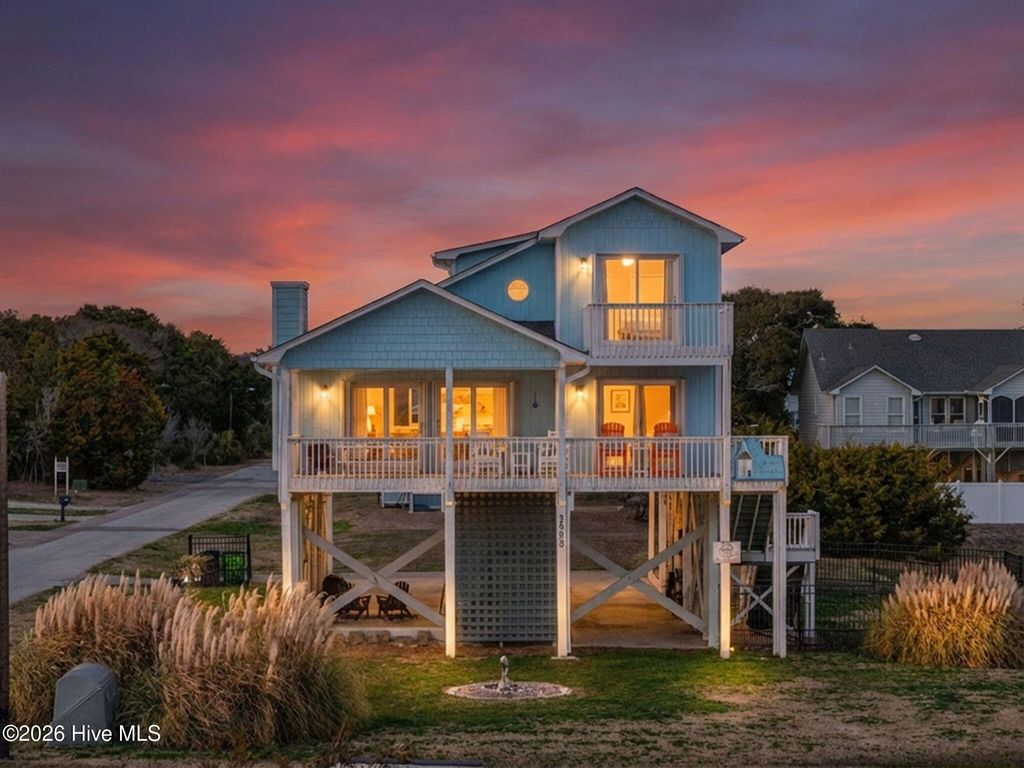 Photo of 2502 E Dolphin Drive, Oak Island, NC 28465 (MLS # 100556711)