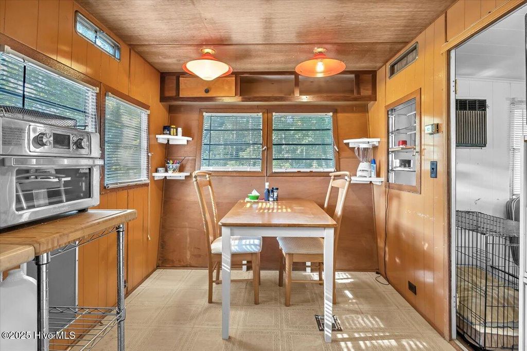 Photo of 230 NE 66th Street, Oak Island, NC 28465 (MLS # 100561013)