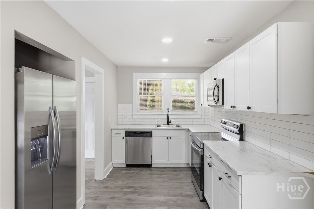 Photo of 122 W 54th Street, Savannah, GA 31405 (MLS # SA354468)