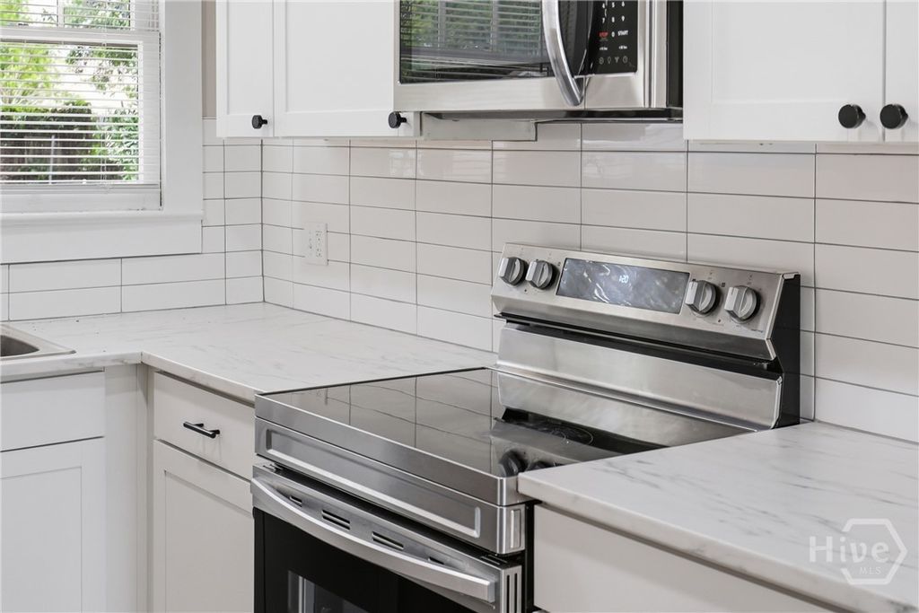 Photo of 122 W 54th Street, Savannah, GA 31405 (MLS # SA354468)