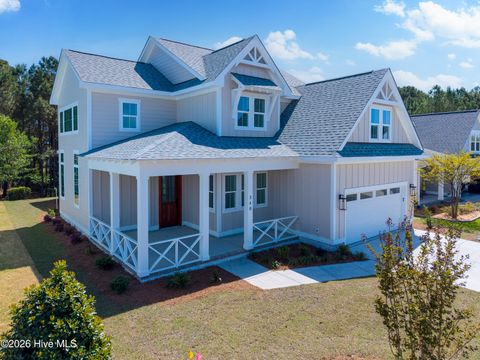 Photo of 340 Spicer Lake Drive, Holly Ridge, NC 28445 (MLS # 100564913)