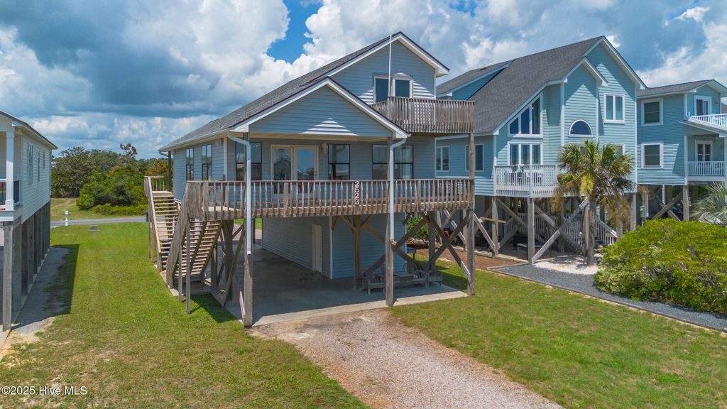 Photo of 2523 W Dolphin Drive, Oak Island, NC 28465 (MLS # 100521626)