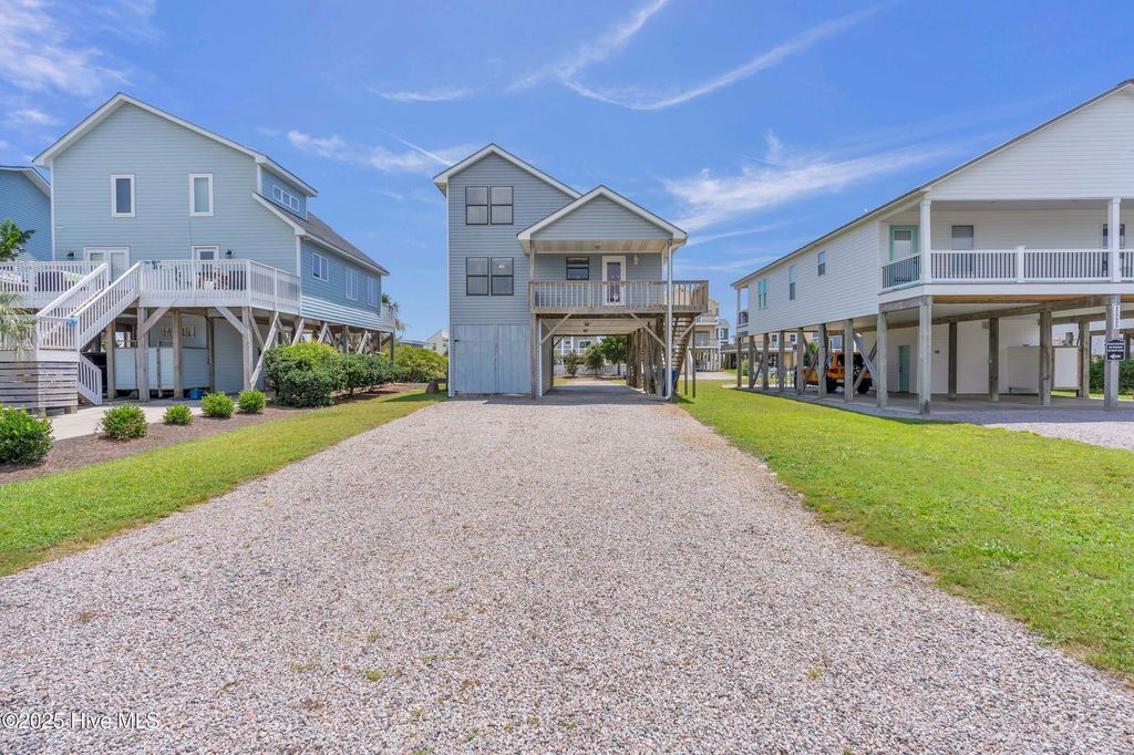 Photo of 2523 W Dolphin Drive, Oak Island, NC 28465 (MLS # 100521626)