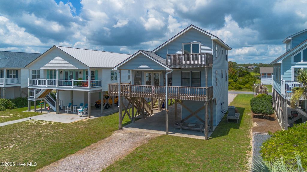 Photo of 2523 W Dolphin Drive, Oak Island, NC 28465 (MLS # 100521626)