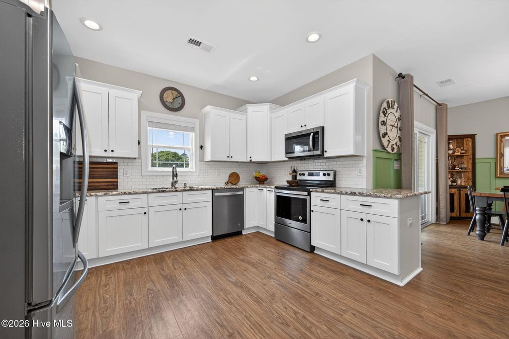Photo of 131 NE 15th Street, Oak Island, NC 28465 (MLS # 100574130)