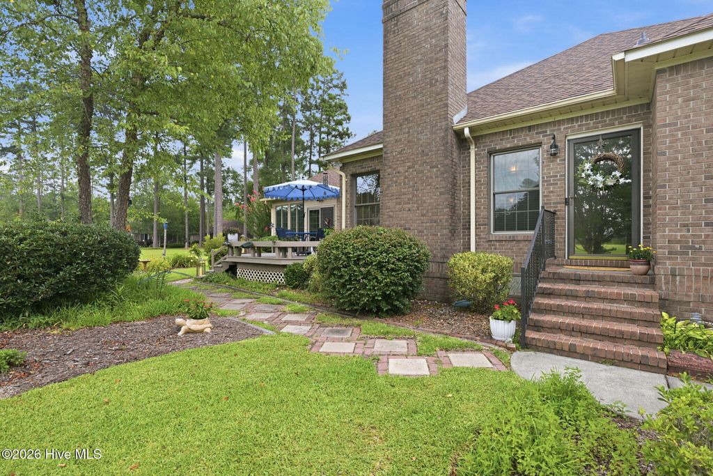 Photo of 8004 Club House Drive, New Bern, NC 28562 (MLS # 100588105)
