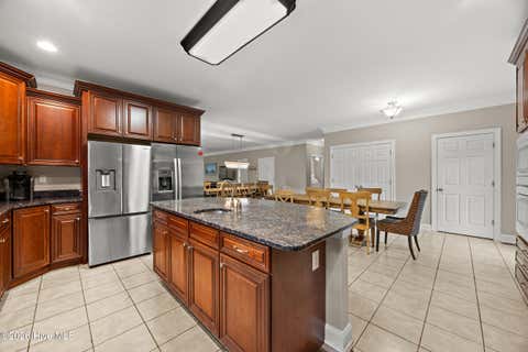Tiny photo for 310 Trott Street, Oak Island, NC 28465 (MLS # 100592064)