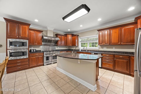 Tiny photo for 310 Trott Street, Oak Island, NC 28465 (MLS # 100592064)