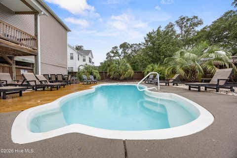 Tiny photo for 310 Trott Street, Oak Island, NC 28465 (MLS # 100592064)