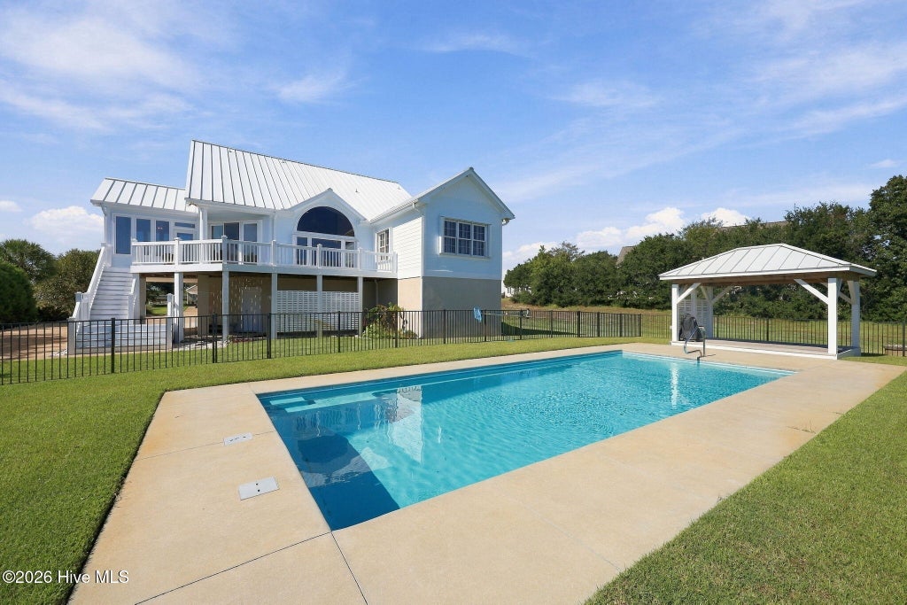 Photo of 526 Ballast Point Road, Hampstead, NC 28443 (MLS # 100610248)