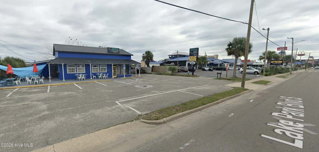 Photo of 304 N Lake Park Boulevard N, Carolina Beach, NC 28428 (MLS # 100595390)