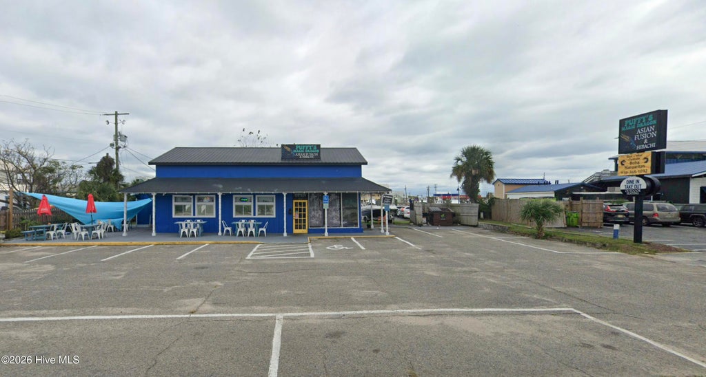 Photo of 304 N Lake Park Boulevard N, Carolina Beach, NC 28428 (MLS # 100595390)