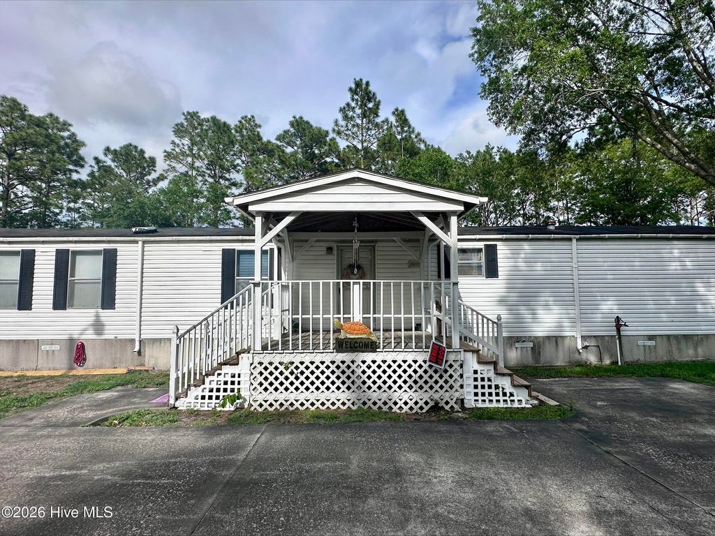 Photo of 945 Mirror Lake Drive, Southport, NC 28461 (MLS # 100577184)