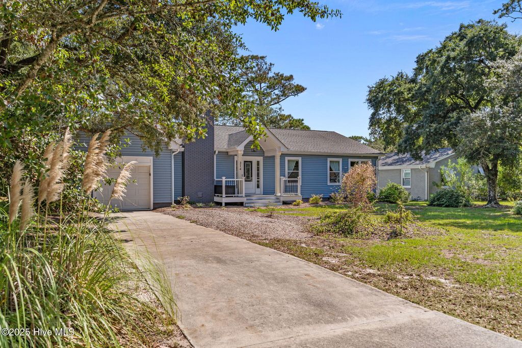 Photo of 214 Mcglamery Street, Oak Island, NC 28465 (MLS # 100534708)