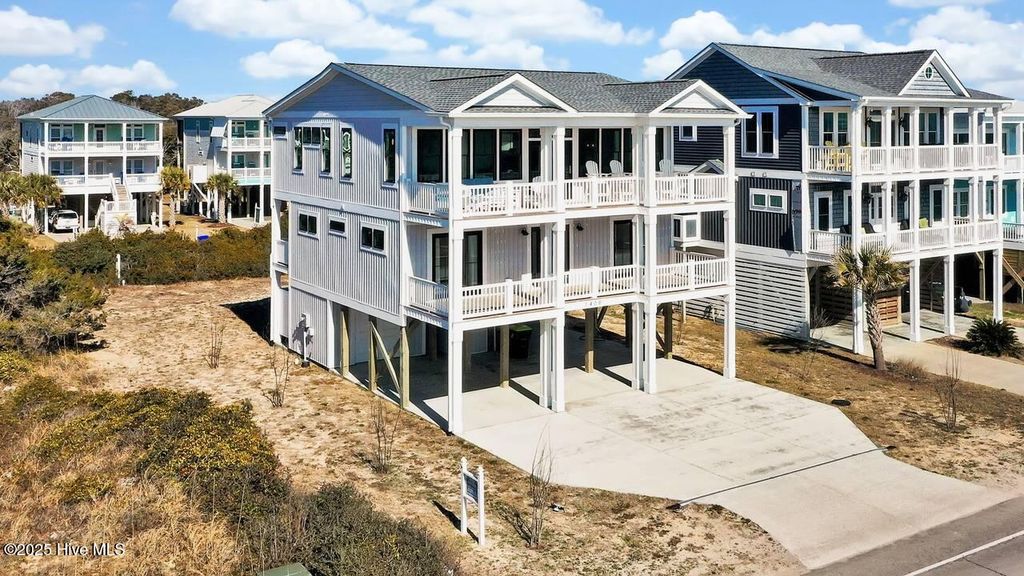 Photo of 1408 E Beach Drive, Oak Island, NC 28465 (MLS # 100541995)