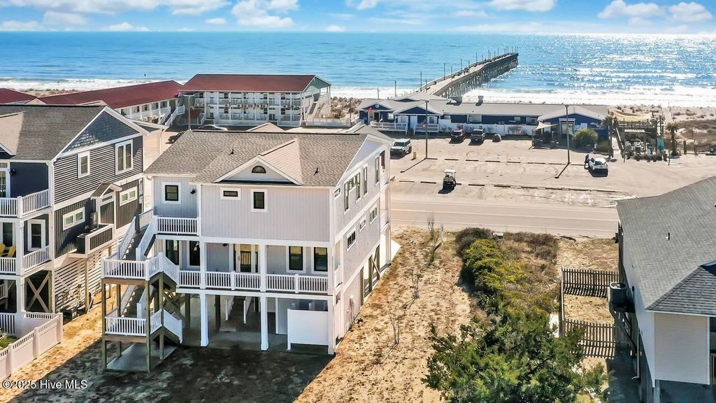 Photo of 1408 E Beach Drive, Oak Island, NC 28465 (MLS # 100541995)