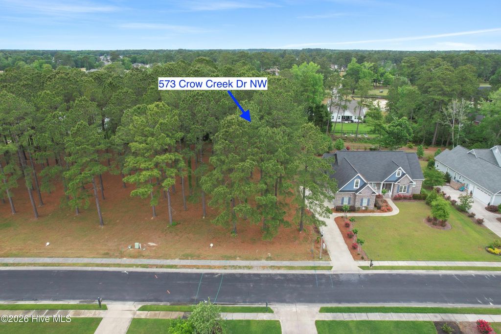 Photo of 573 Crow Creek Drive NW, Calabash, NC 28467 (MLS # 100572361)