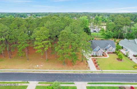 Photo of 573 Crow Creek Drive NW, Calabash, NC 28467 (MLS # 100572361)