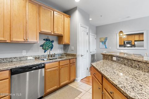 Tiny photo for 700 Ocean Drive #Unit 117, Oak Island, NC 28465 (MLS # 100545240)