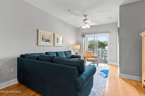 Tiny photo for 700 Ocean Drive #Unit 117, Oak Island, NC 28465 (MLS # 100545240)
