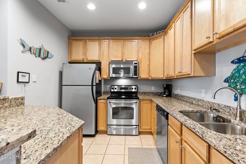 Tiny photo for 700 Ocean Drive #Unit 117, Oak Island, NC 28465 (MLS # 100545240)