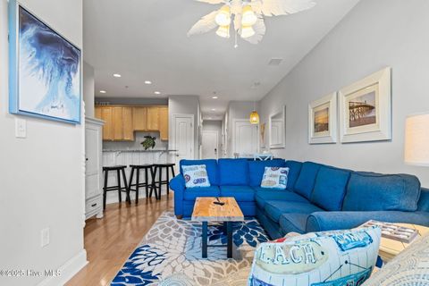 Tiny photo for 700 Ocean Drive #Unit 117, Oak Island, NC 28465 (MLS # 100545240)