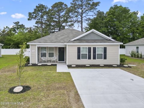 Photo of 1714 Whispering Pine Street SW, Ocean Isle Beach, NC 28469 (MLS # 100547416)