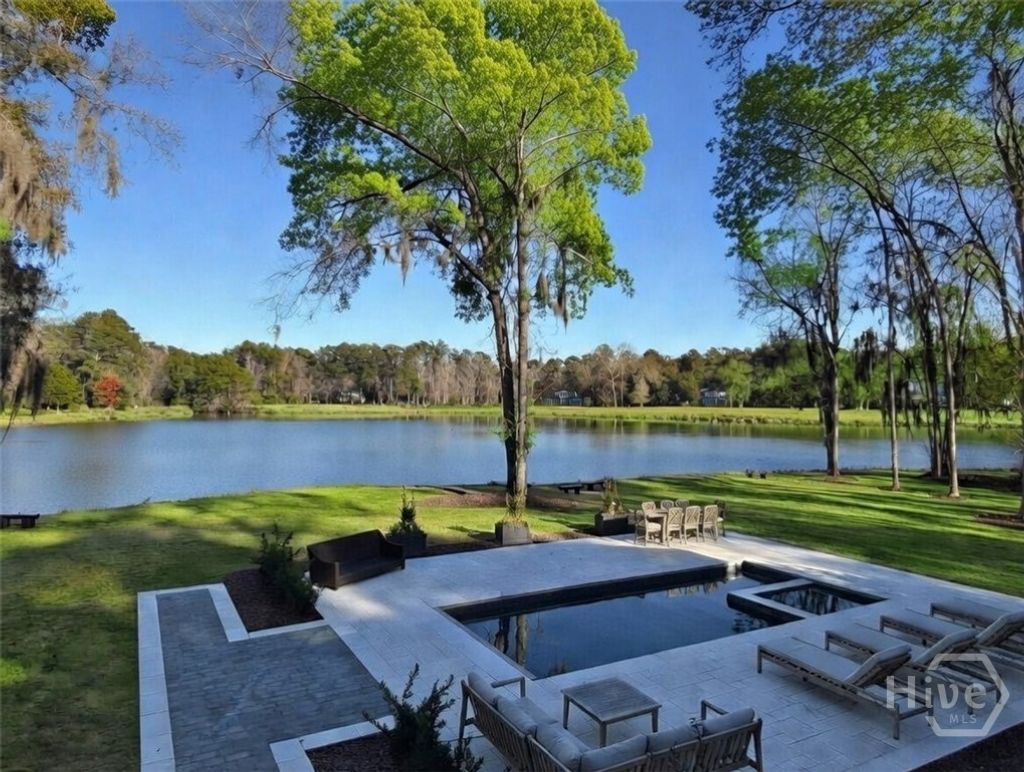 Photo of 437 Belted Kingfisher Lane, Richmond Hill, GA 31324 (MLS # SA346510)