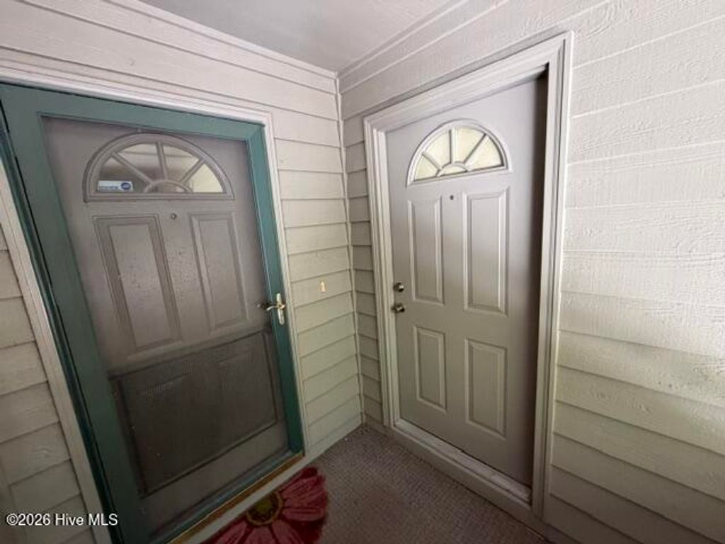 Photo of 212 Kings Trail #Apt D, Sunset Beach, NC 28468 (MLS # 100583713)