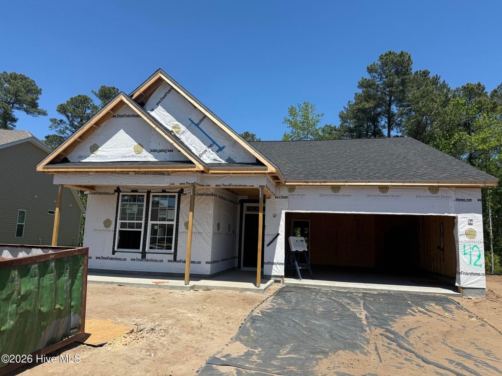 Photo of 1081 Rosefield Way NW, Carolina Shores, NC 28467 (MLS # 100600142)