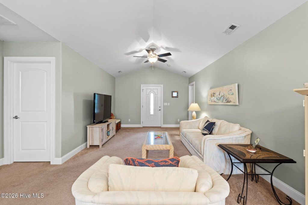 Photo of 133 NE 3rd Street, Oak Island, NC 28465 (MLS # 100575937)