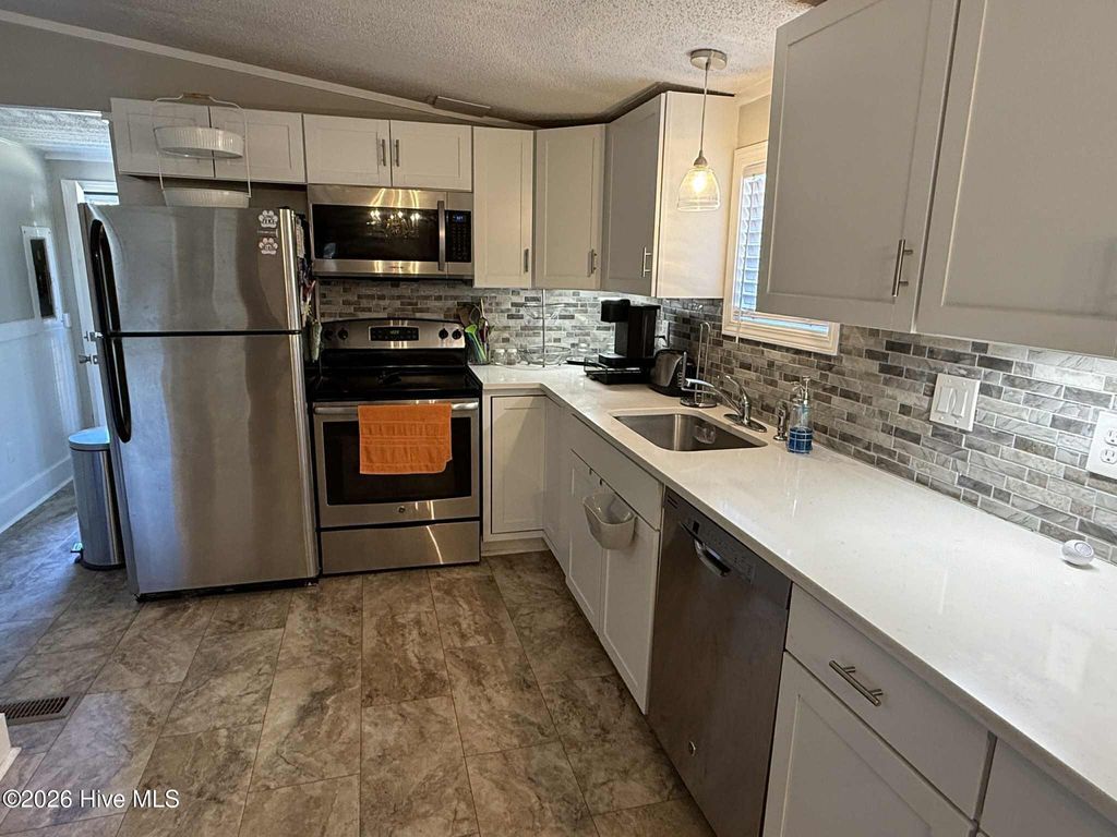 Photo of 2447 Pinewood Drive SW, Supply, NC 28462 (MLS # 100549853)