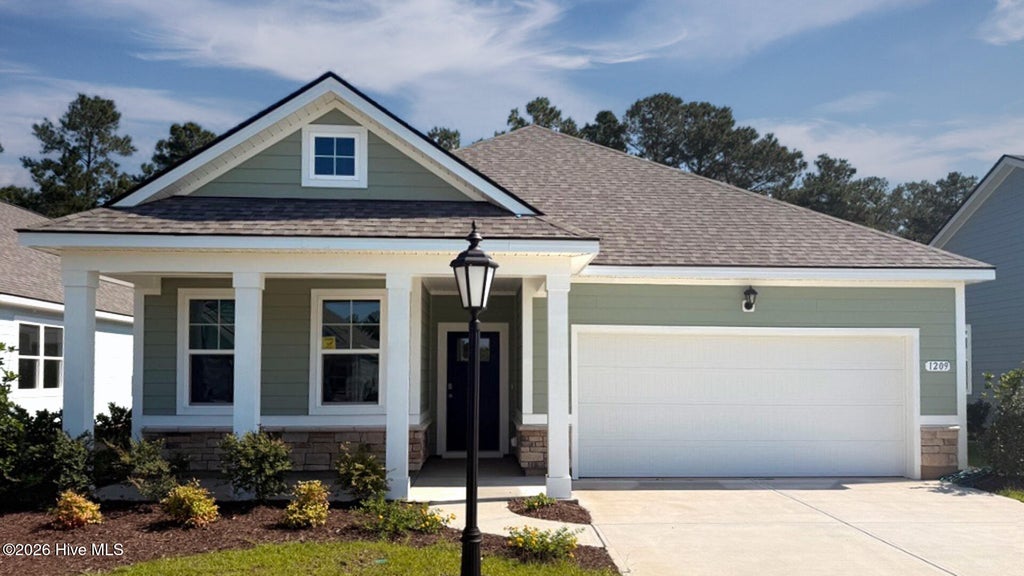 Photo of 1209 Woodhouse Drive NW, Ash, NC 28420 (MLS # 100510296)