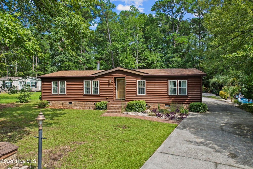 Photo of 227 Ocean Forest Drive NW, Calabash, NC 28467 (MLS # 100599204)