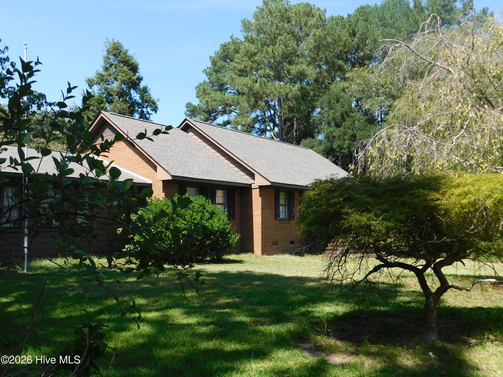 Photo of 1603 Lake Drive, Laurinburg, NC 28352 (MLS # 100603712)
