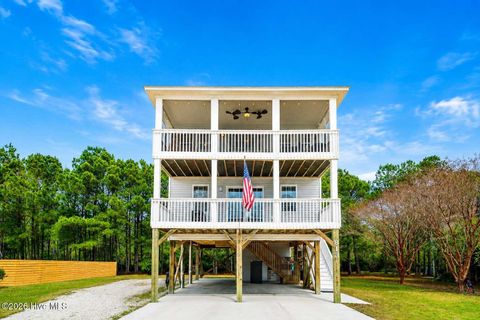 Photo of 813 Driftwood Drive, Hampstead, NC 28443 (MLS # 100572990)
