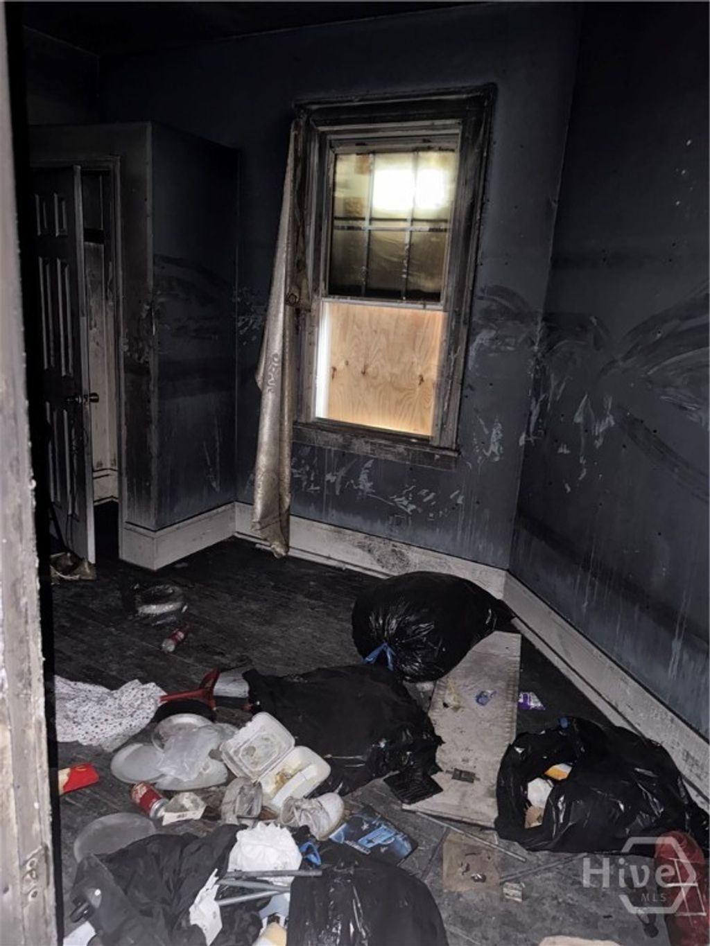 Photo of 641 W 39th Street, Savannah, GA 31415 (MLS # SA346416)