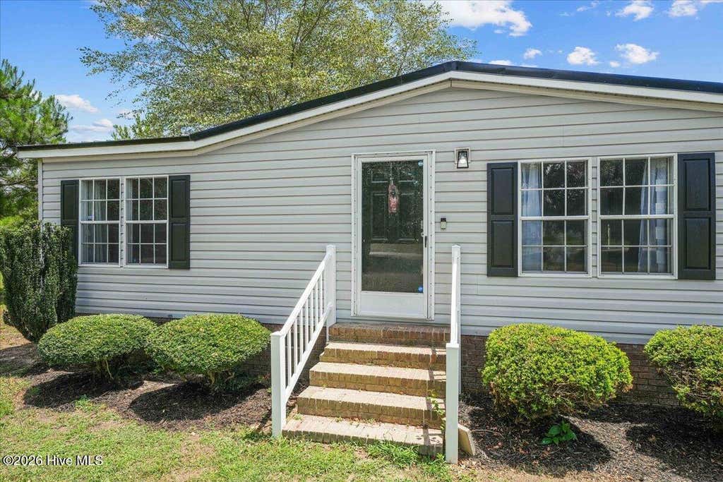Photo of 6370 Wayne Memorial Drive NE, Pikeville, NC 27863 (MLS # 100584630)